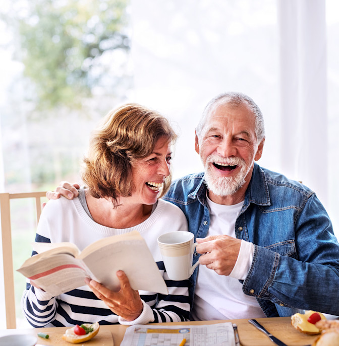Macular degeneration patient older couple laughing