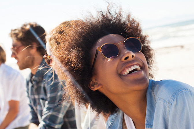 Girl with prescription sunglasses after eye exam