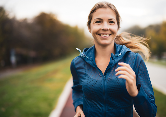 Girl running after LASIK surgery near you